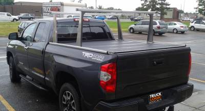 Adarac Aluminum Pro ladder rack and Bak Flip MX4 tonneau cover on a Toyota Tundra